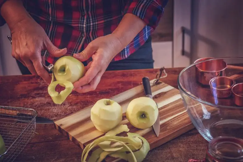 Peeling the apples