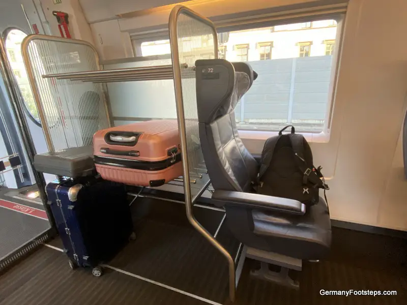 ICE first class cabin Germany with baggage rack and seat